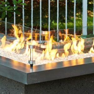 Stock Image - The Outdoor GreatRoom -  Linear L-Shaped Glass Wind Guard The Outdoor Greatroom Company Fire Pit Accessory - Chimney Doctors of Colorado